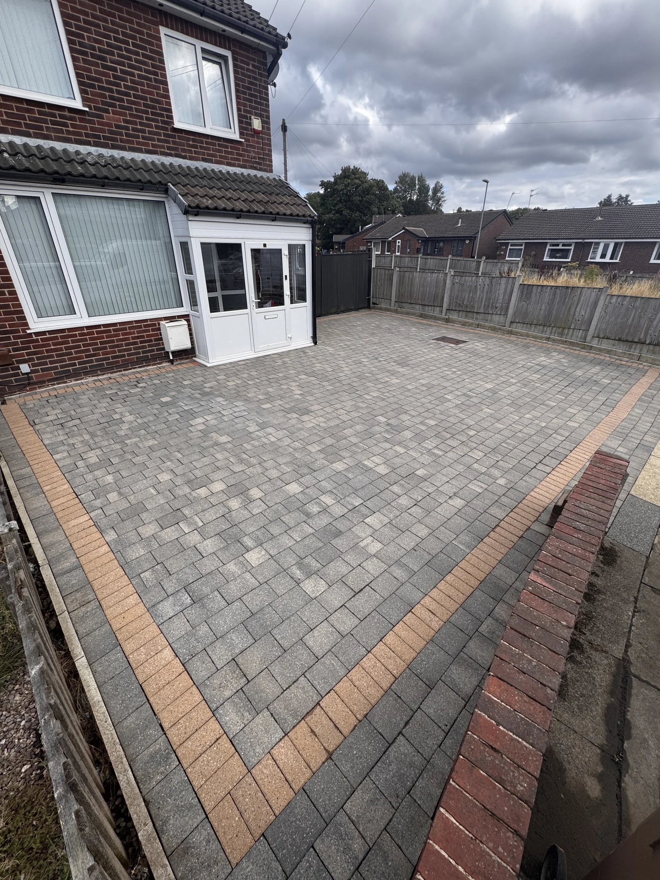 The same paved courtyard after professional cleaning