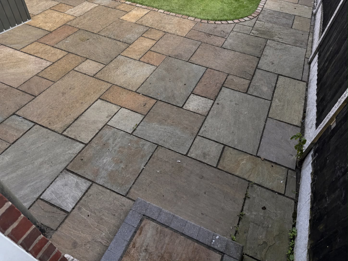 Natural stone patio before and after professional exterior cleaning before
